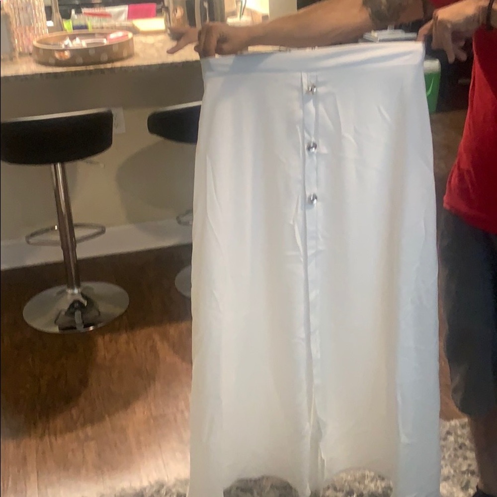 White maxi skirt with gold buttons